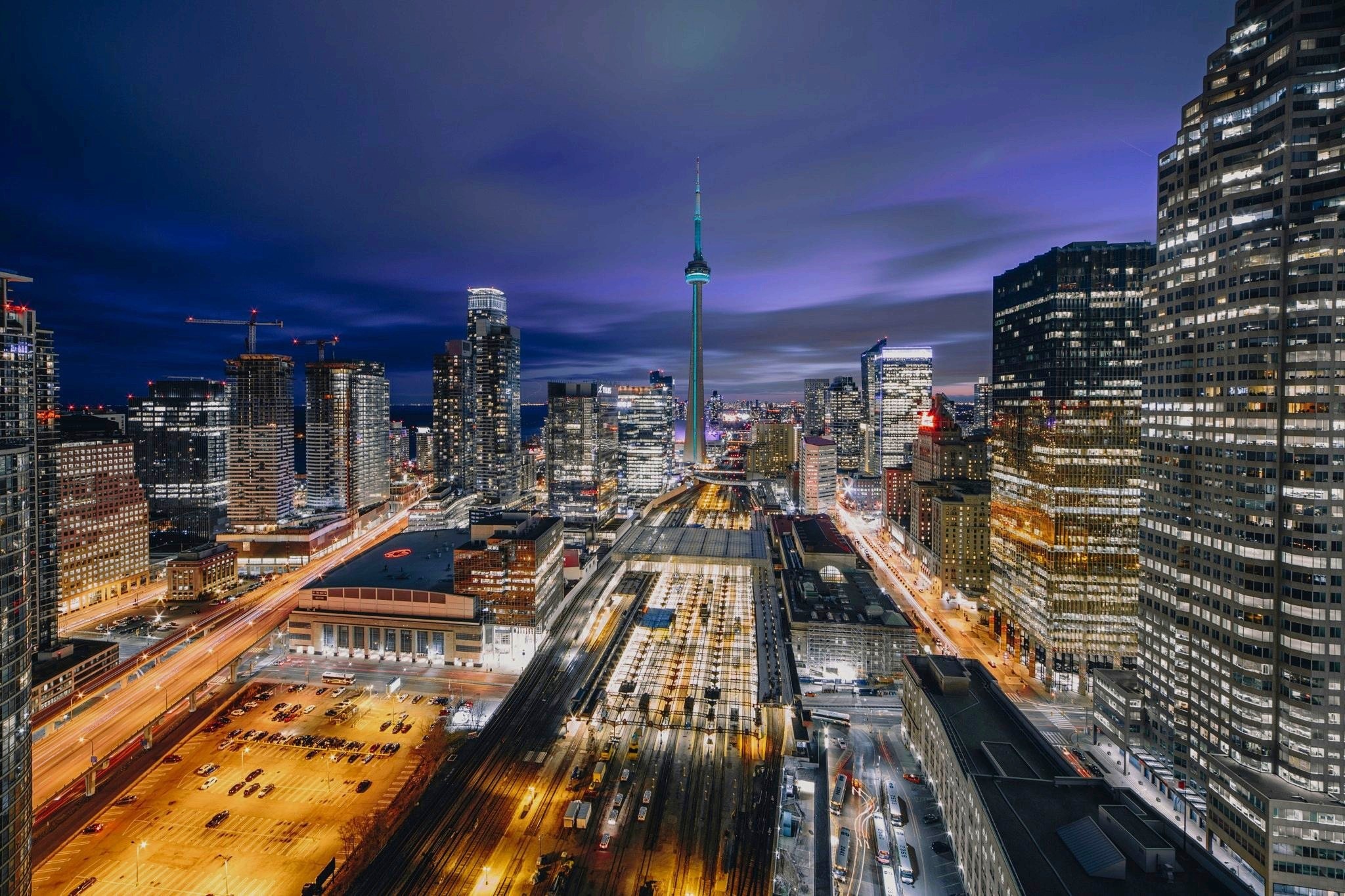 Toronto skyline at night for Axu investor relations